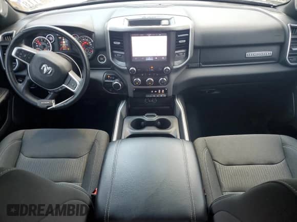 2023 Ram 1500 Big Horn with VIN 1C6RREFT6PN573744, listed as a Copart auction lot 58809175 with 35,469 mi miles and Salvage title. Bid and sale history available at DreamBid. Image 8.