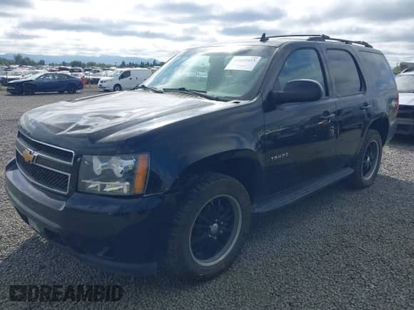 2013 Chevrolet Tahoe LS with VIN 1GNSKAE09DR234776, listed as a IAAI auction lot 42605423 with 200,433 mi miles and . Bid and sale history available at DreamBid. Image 19.