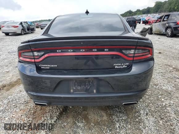 2015 Dodge Charger SXT with VIN 2C3CDXJG1FH762879, listed as a Copart auction lot 65022915 with 117,269 mi miles and Salvage title. Bid and sale history available at DreamBid. Image 6.