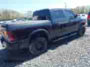 2018 Ram 1500 Rebel with VIN 1C6RR7YT4JS145768, listed as a IAAI auction lot 41593734 with 66,820 mi miles and . Bid and sale history available at DreamBid. Image 4.