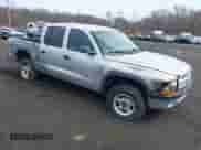 2003 Dodge Dakota Sport with VIN 1D7HG38X13S267227, listed as a IAAI auction lot 41952281 with 119,641 mi miles and . Bid and sale history available at DreamBid. Image 1.