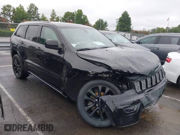 2020 Jeep Grand Cherokee Laredo E with VIN 1C4RJEAG3LC372299, listed as a IAAI auction lot 42915775 with 92,823 mi miles and . Bid and sale history available at DreamBid. Image 1.