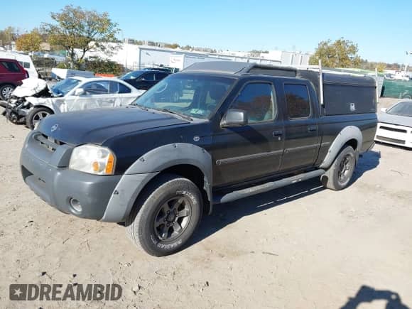 2002 Nissan Frontier SE with VIN 1N6ED29X92C323614, listed as a IAAI auction lot 43550328 with 232,831 mi miles and . Bid and sale history available at DreamBid. Image 2.