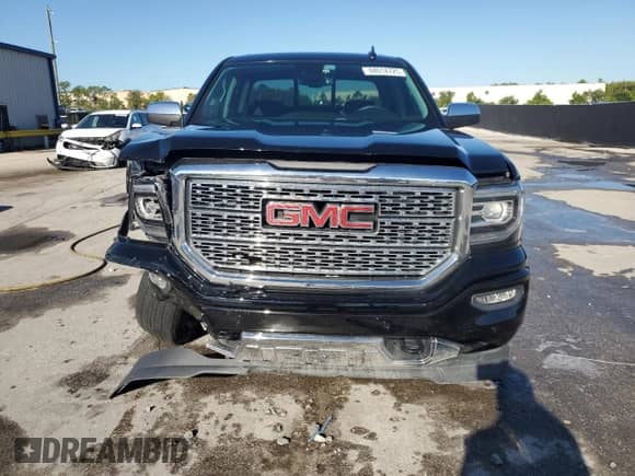 2018 GMC Sierra 1500 Denali z VIN 3GTP1PEC7JG387781, wystawiony jako Copart lot #84014725 z przebiegiem 89 899 mil mil oraz Szkoda całkowita • Salvage title. Historia ofert i sprzedaży dostępna na DreamBid. Obrazek 5.