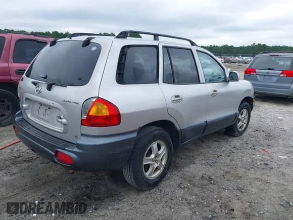2002 Hyundai Santa Fe GLS with VIN KM8SC13D92U149292, listed as a IAAI auction lot 42894176 with 203,722 mi miles and . Bid and sale history available at DreamBid. Image 4.