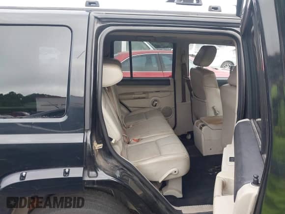 2006 Jeep Commander Limited z VIN 1J8HH58N96C280493, wystawiony jako IAAI lot #42589014 z przebiegiem 234 739 mil mil oraz . Historia ofert i sprzedaży dostępna na DreamBid. Obrazek 8.