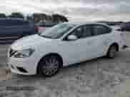 2017 Nissan Sentra S z VIN 3N1AB7AP5HY209273, wystawiony jako Copart lot #85712275 z przebiegiem 129 873 mil mil oraz Szkoda całkowita • Salvage title. Historia ofert i sprzedaży dostępna na DreamBid. Obrazek 1.