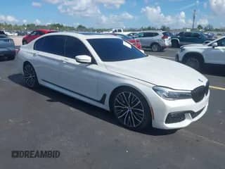 2019 BMW 7 Series 740i with VIN WBA7E2C50KB216678, listed as a IAAI auction lot 42517585 with 56,572 mi miles and . Bid and sale history available at DreamBid. Image 1.