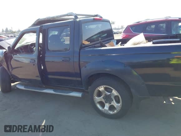2001 Nissan Frontier with VIN 1N6MD27T41C389353, listed as a IAAI auction lot 37914035 with 89,895 mi miles and . Bid and sale history available at DreamBid. Image 14.