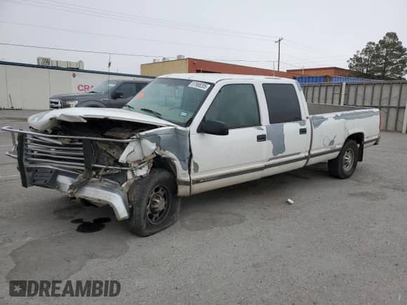 1998 Chevrolet Silverado 3500 с VIN 1GCGC33R6WF062753, выставлен на аукционе Copart как лот 67075235 с пробегом 239 037 миль миль и Списание • Salvage title. История ставок и продаж доступна на DreamBid. Изображение 1.