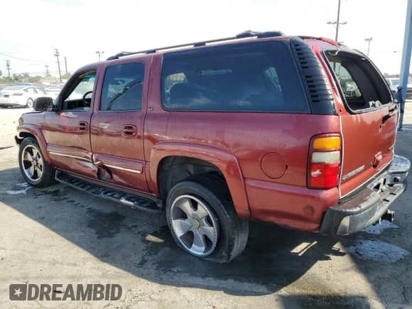 2002 Chevrolet Suburban LT with VIN 1GNEC16T92J263290, listed as a Copart auction lot 68007235 with 140,125 mi miles and Salvage title. Bid and sale history available at DreamBid. Image 2.