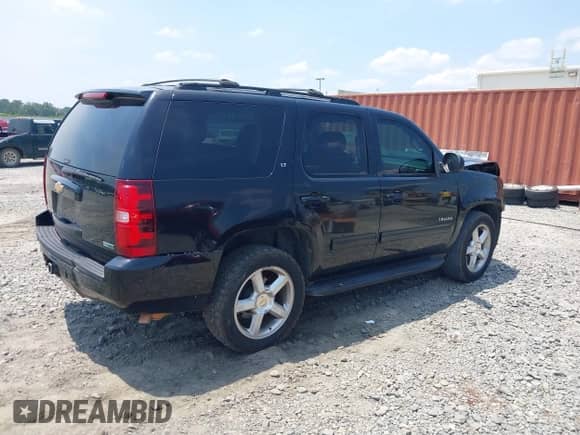 2012 Chevrolet Tahoe LT with VIN 1GNSCBE01CR130929, listed as a IAAI auction lot 42342129 with 234,628 mi miles and . Bid and sale history available at DreamBid. Image 4.