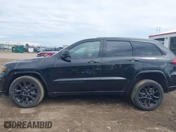 2020 Jeep Grand Cherokee Altitude with VIN 1C4RJFAG5LC234740, listed as a IAAI auction lot 42918695 with 64,445 mi miles and . Bid and sale history available at DreamBid. Image 14.