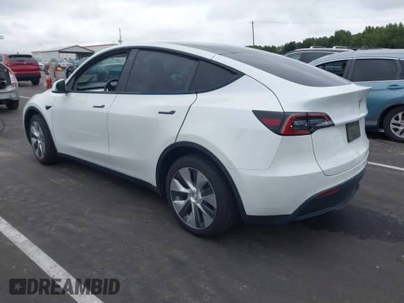 2022 Tesla Model Y Long Range z VIN 7SAYGDEE6NF317707, wystawiony jako IAAI lot #43186532 z przebiegiem 45 306 mil mil oraz . Historia ofert i sprzedaży dostępna na DreamBid. Obrazek 3.