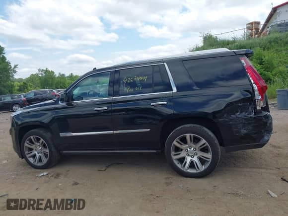 2015 Cadillac Escalade Premium z VIN 1GYS4CKJ9FR254258, wystawiony jako IAAI lot #42574409 z przebiegiem 129 511 mil mil oraz . Historia ofert i sprzedaży dostępna na DreamBid. Obrazek 14.