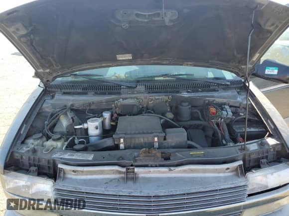 2000 Chevrolet Astro с VIN 1GNEL19W2YB162505, выставлен на аукционе Copart как лот 66702904 с пробегом Не указан миль и Списание • Salvage title. История ставок и продаж доступна на DreamBid. Изображение 13.