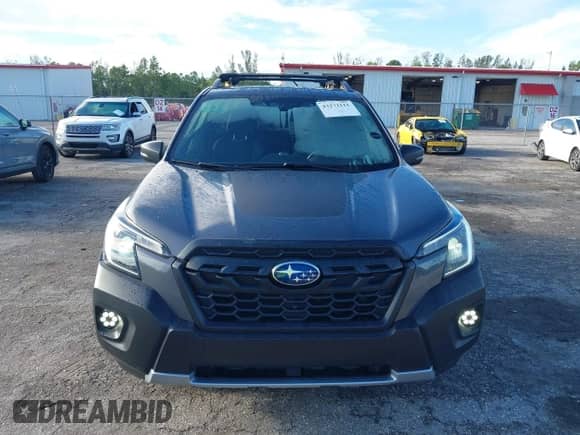 2022 Subaru Forester Wilderness with VIN JF2SKAMC4NH423882, listed as a IAAI auction lot 43272111 with 77,225 mi miles and . Bid and sale history available at DreamBid. Image 13.