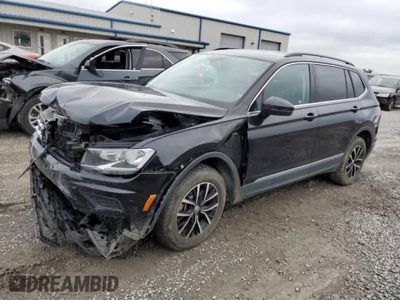 2021 Volkswagen Tiguan SE с VIN 3VV3B7AXXMM105712, выставлен на аукционе Copart как лот 61154945 с пробегом 83 656 миль миль и Списание • Salvage title. История ставок и продаж доступна на DreamBid. Изображение 1.