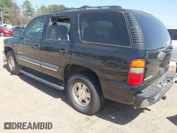 2003 Chevrolet Tahoe LT z VIN 1GNEC13Z03R318933, wystawiony jako IAAI lot #41828148 z przebiegiem 192 851 mil mil oraz . Historia ofert i sprzedaży dostępna na DreamBid. Obrazek 3.