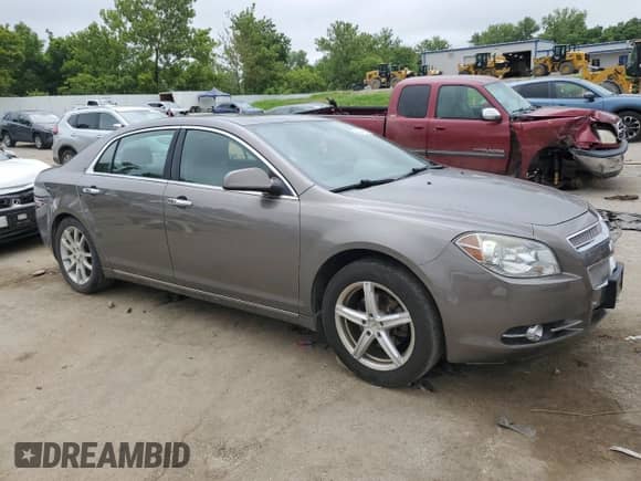 2010 Chevrolet Malibu LTZ with VIN 1G1ZE5E79A4147903, listed as a Copart auction lot 66949835 with 177,584 mi miles and Salvage title. Bid and sale history available at DreamBid. Image 4.