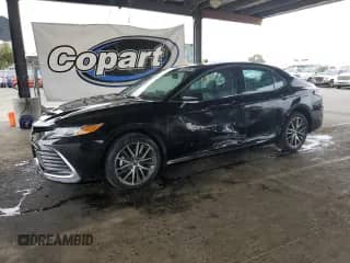 2024 Toyota Camry Hybrid XLE with VIN 4T1F31AK2RU625122, listed as a Copart auction lot 81657395 with 28,442 mi miles and Clean title. Bid and sale history available at DreamBid. Image 1.