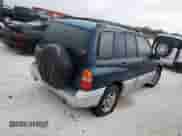 2002 Chevrolet Tracker LT с VIN 2CNBE634126928532, выставлен на аукционе Copart как лот 76990704 с пробегом Не указан миль и Списание • Salvage title. История ставок и продаж доступна на DreamBid. Изображение 3.