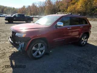 2015 Jeep Grand Cherokee Overland with VIN 1C4RJFCG5FC922447, listed as a Copart auction lot 82771405 with 118,758 mi miles and Salvage title. Bid and sale history available at DreamBid. Image 1.