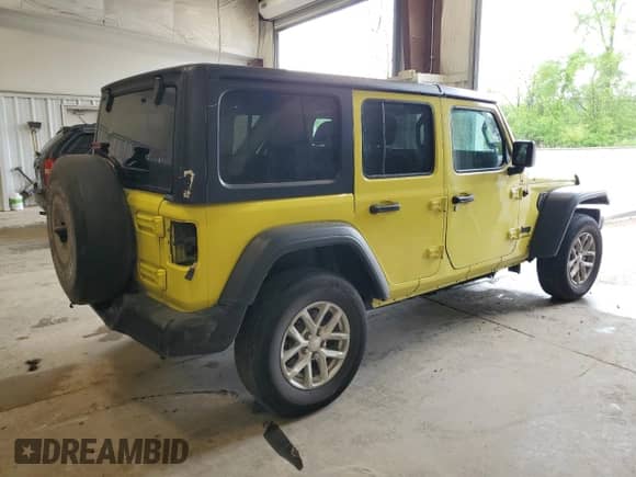 2023 Jeep Wrangler Willys with VIN 1C4HJXDG0PW653712, listed as a Copart auction lot 58603245 with 66,598 mi miles and Salvage title. Bid and sale history available at DreamBid. Image 3.