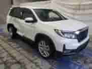 2024 Honda Passport EX-L with VIN 5FNYF8H54RB020153, listed as a Copart auction lot 59444465 with 13,958 mi miles and Salvage title. Bid and sale history available at DreamBid. Image 4.