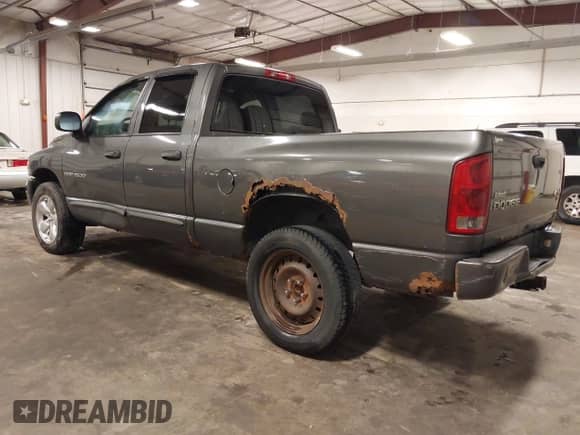 2004 Dodge 1500 SLT z VIN 1D7HU18D54S689859, wystawiony jako IAAI lot #43261080 z przebiegiem 218 034 mil mil oraz . Historia ofert i sprzedaży dostępna na DreamBid. Obrazek 3.