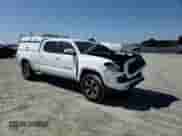 2018 Toyota Tacoma SR5 с VIN 3TMBZ5DN7JM012484, выставлен на аукционе Copart как лот 60505065 с пробегом 290 718 миль миль и Списание • Salvage title. История ставок и продаж доступна на DreamBid. Изображение 13.