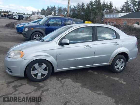 2011 Chevrolet Aveo 1LT with VIN KL1TD5DE6BB215854, listed as a IAAI auction lot 41681408 with 141,848 mi miles and . Bid and sale history available at DreamBid. Image 13.