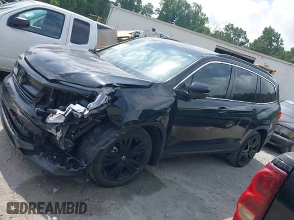 2021 Honda Pilot Special Edition with VIN 5FNYF6H21MB094505, listed as a IAAI auction lot 42603238 with 54,081 mi miles and . Bid and sale history available at DreamBid. Image 14.