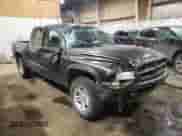 2003 Dodge Dakota Sport с VIN 1D7HG38N43S369703, выставлен на аукционе Copart как лот 79664404 с пробегом 225 257 миль миль и Списание • Salvage title. История ставок и продаж доступна на DreamBid. Изображение 4.