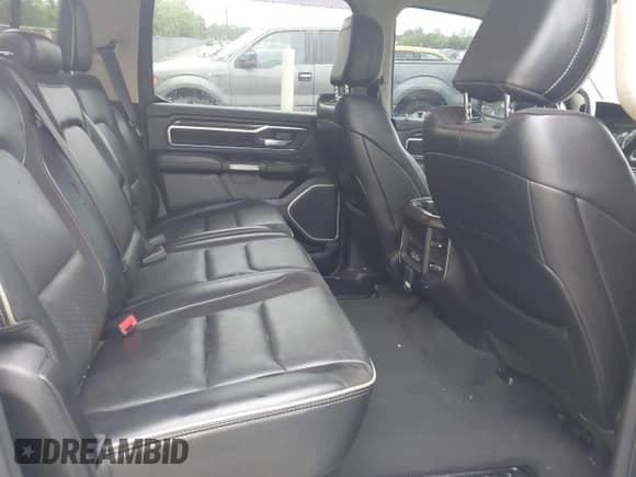 2021 Ram 1500 Laramie with VIN 1C6RREJT5MN628655, listed as a IAAI auction lot 42734346 with 104,116 mi miles and . Bid and sale history available at DreamBid. Image 8.