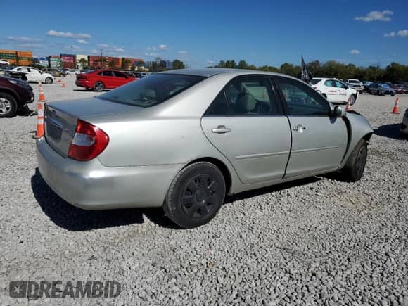 2003 Toyota Camry XLE с VIN 4T1BE32K93U230591, выставлен на аукционе Copart как лот 82388735 с пробегом 185 254 миль миль и Списание • Salvage title. История ставок и продаж доступна на DreamBid. Изображение 3.