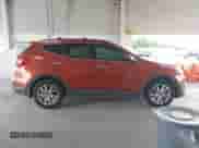 2016 Hyundai Santa Fe z VIN 5XYZUDLA5GG305912, wystawiony jako IAAI lot #42669257 z przebiegiem 140 850 mil mil oraz . Historia ofert i sprzedaży dostępna na DreamBid. Obrazek 13.
