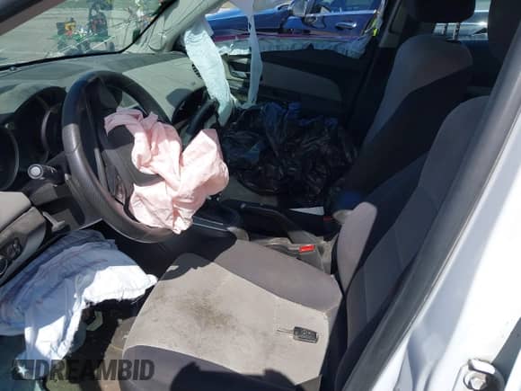 2015 Chevrolet Cruze LS with VIN 1G1PB5SHXF7231716, listed as a IAAI auction lot 41764515 with 200,094 mi miles and . Bid and sale history available at DreamBid. Image 5.