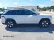 2024 Jeep Grand Cherokee with VIN 1C4RJYB63RC720666, listed as a IAAI auction lot 43307627 with 49,304 mi miles and . Bid and sale history available at DreamBid. Image 13.