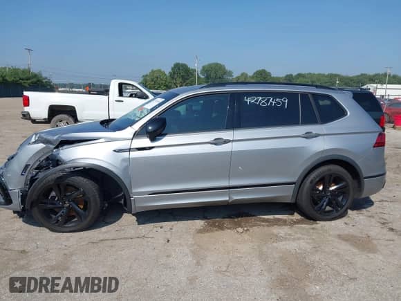 2023 Volkswagen Tiguan SE R-Line Black с VIN 3VVCB7AX2PM055070, выставлен на аукционе IAAI как лот 42787459 с пробегом 88 798 миль миль и . История ставок и продаж доступна на DreamBid. Изображение 14.