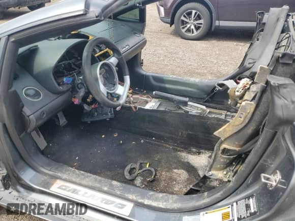 2009 Lamborghini Gallardo with VIN ZHWGU64T19LA08723, listed as a Copart auction lot 53265785 with Not provided miles and Non repairable. Bid and sale history available at DreamBid. Image 7.