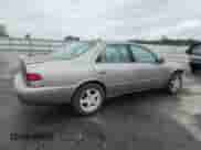 1997 Toyota Camry LE с VIN 4T1BG22K4VU145407, выставлен на аукционе Copart как лот 81957505 с пробегом 235 189 миль миль и Списание • Salvage title. История ставок и продаж доступна на DreamBid. Изображение 3.