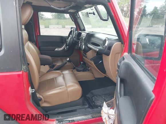 2011 Jeep Wrangler Rubicon with VIN 1J4BA6D19BL641459, listed as a IAAI auction lot 42512300 with 117,476 mi miles and . Bid and sale history available at DreamBid. Image 5.
