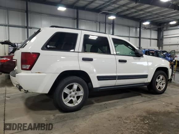 2006 Jeep Grand Cherokee Laredo с VIN 1J4GR48K76C255988, выставлен на аукционе Copart как лот 85323595 с пробегом 171 036 миль миль и Списание • Salvage title. История ставок и продаж доступна на DreamBid. Изображение 3.