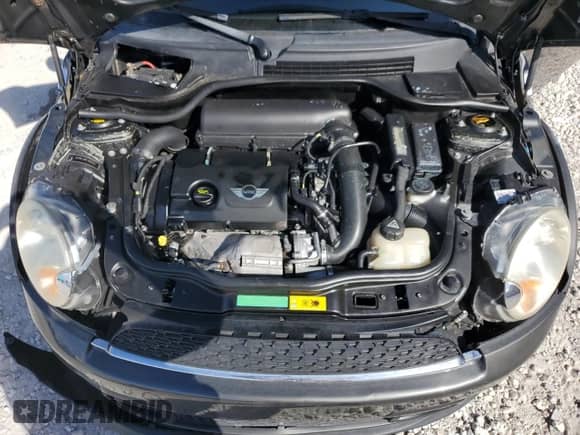 2011 MINI Hardtop S with VIN WMWSV3C58BTY11594, listed as a Copart auction lot 82583025 with 98,138 mi miles and Salvage title. Bid and sale history available at DreamBid. Image 11.