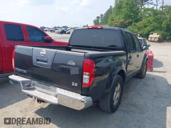 2006 Nissan Frontier SE with VIN 1N6AD07U76C461640, listed as a IAAI auction lot 42377825 with 228,611 mi miles and . Bid and sale history available at DreamBid. Image 4.