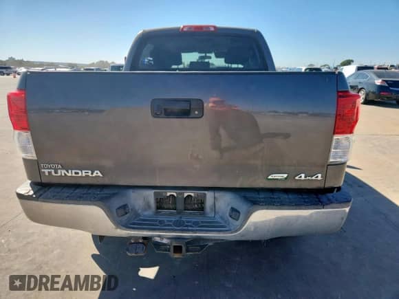 2011 Toyota Tundra with VIN 5TFDW5F11BX172027, listed as a Copart auction lot 84942185 with 208,073 mi miles and Salvage title. Bid and sale history available at DreamBid. Image 6.