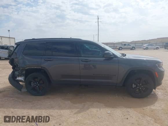 2023 Jeep Grand Cherokee Altitude with VIN 1C4RJKAG0P8700978, listed as a IAAI auction lot 42143863 with Not provided miles and . Bid and sale history available at DreamBid. Image 14.