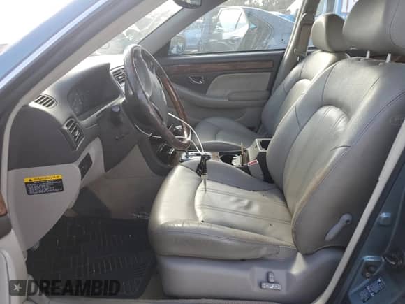 2005 Hyundai XG z VIN KMHFU45E15A378903, wystawiony jako Copart lot #79808694 z przebiegiem 74 994 mil mil oraz Szkoda całkowita • Salvage title. Historia ofert i sprzedaży dostępna na DreamBid. Obrazek 7.