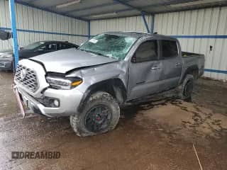 2021 Toyota Tacoma TRD Off Road с VIN 3TMCZ5AN1MM407287, выставлен на аукционе Copart как лот 83750445 с пробегом 72 935 миль миль и Списание • Salvage title. История ставок и продаж доступна на DreamBid. Изображение 1.